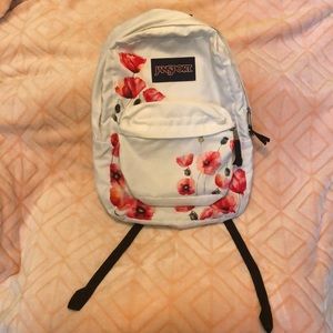 Girls book bag Jansport white with flowers compartment in front adjustable